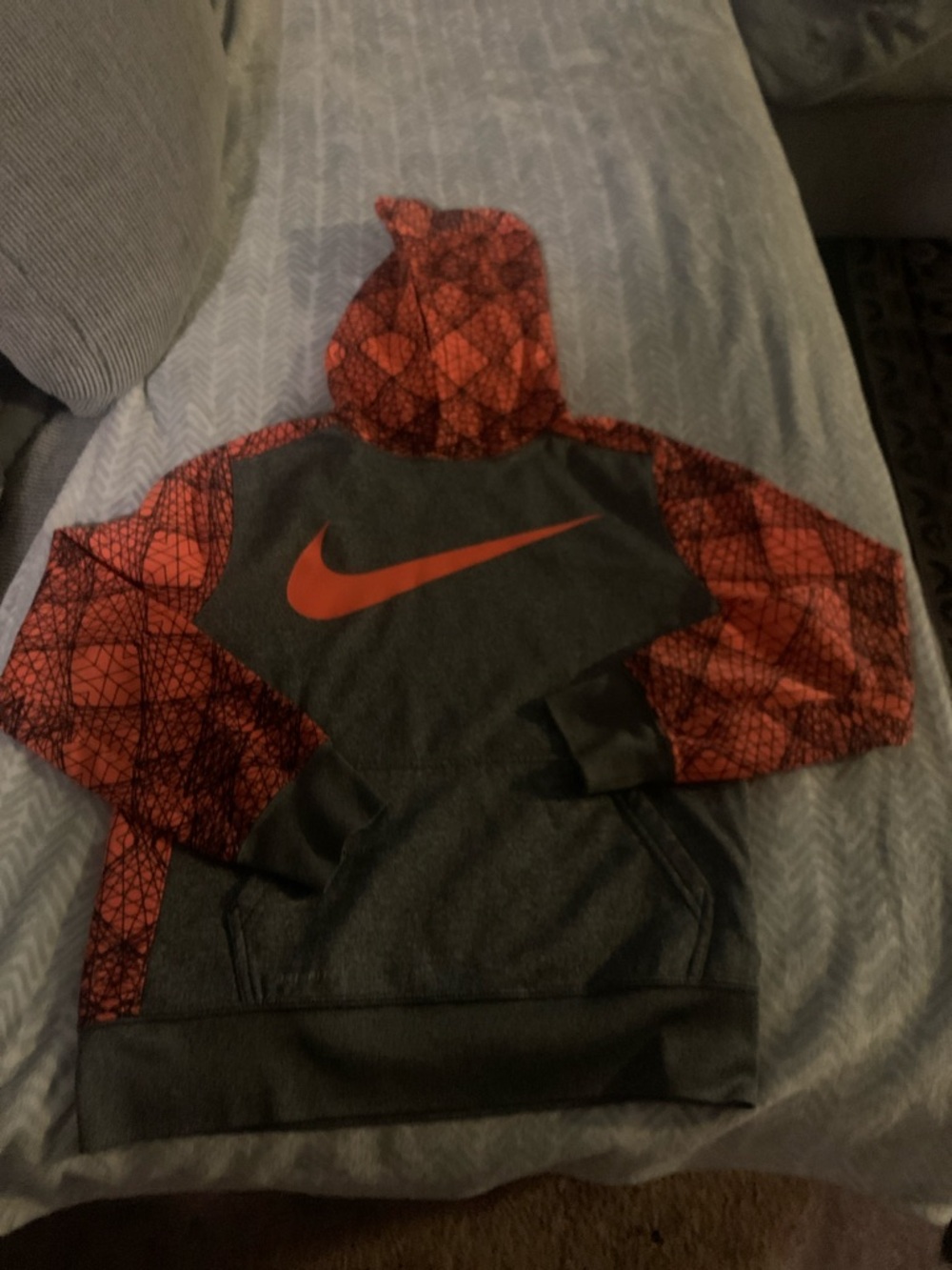 Nike Kids Charcoal Gray Hoodie with Red Graphic Sleeves
